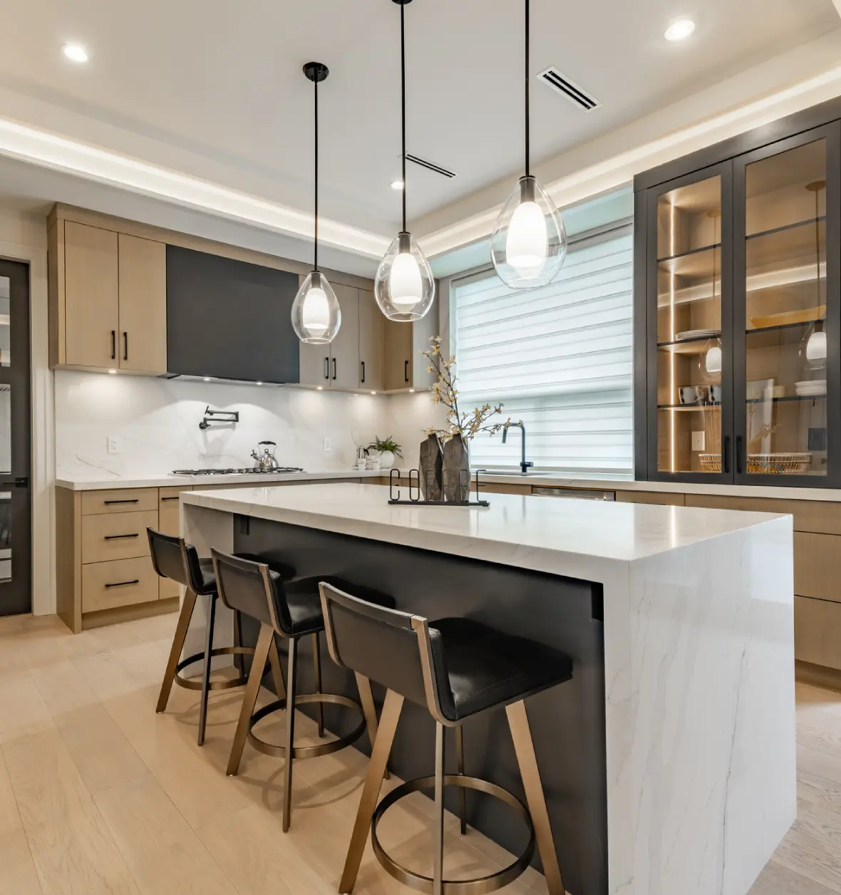 Group 8 (8) (2) Modern kitchen with island and pendant lights.