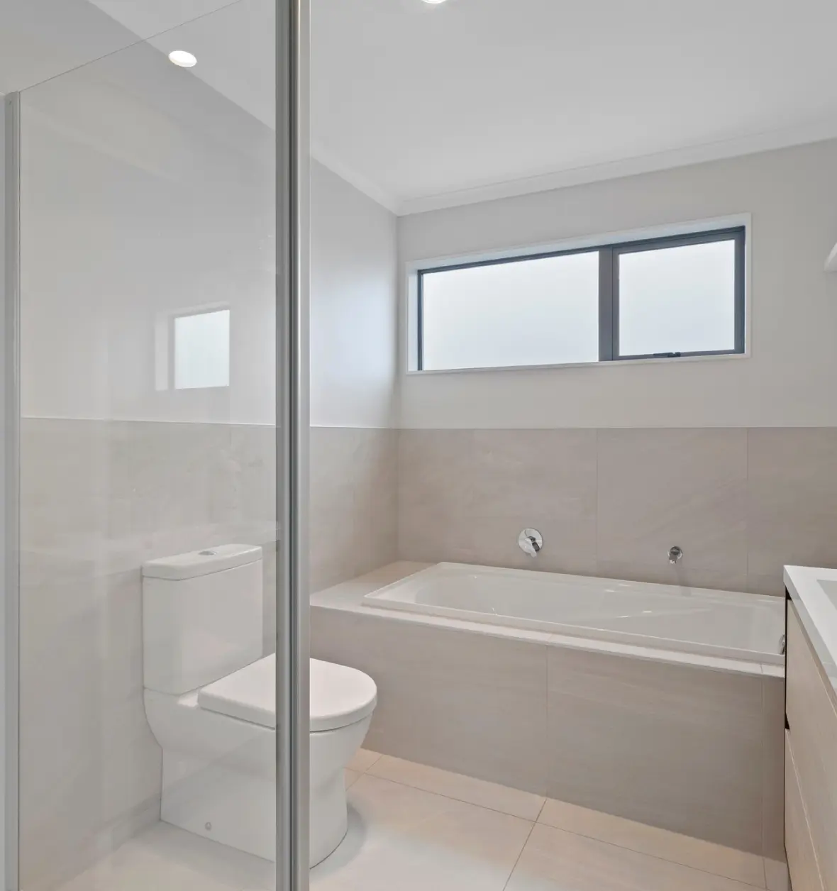 Group 8 (8) (4) Modern bathroom with bathtub and toilet.